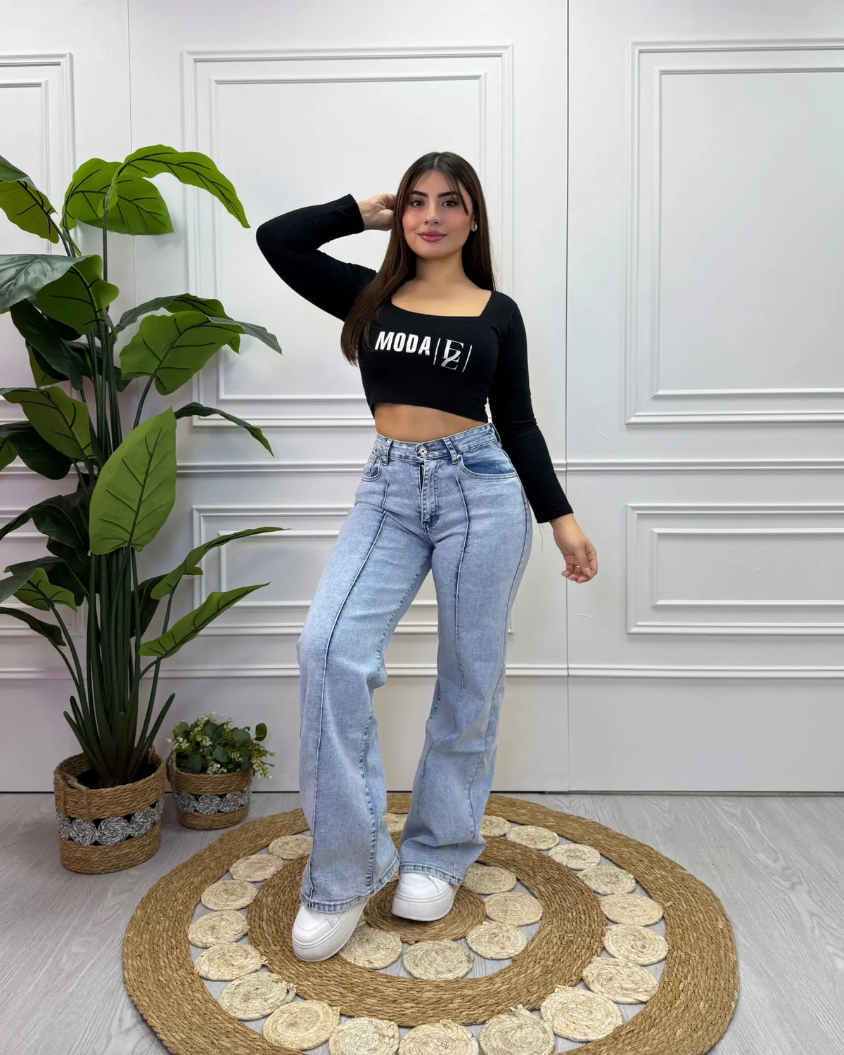 Jeans palazzo celeste con diseño lineal para mujer